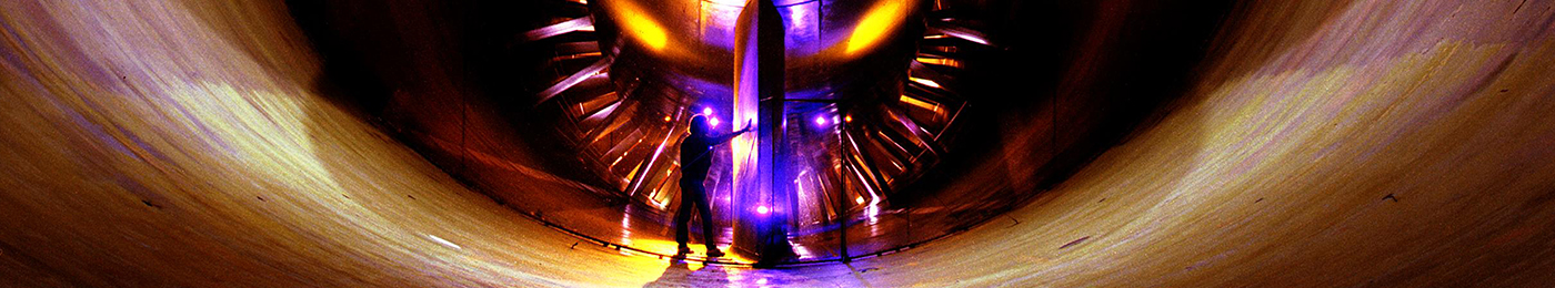 A technician working in a wind tunnel